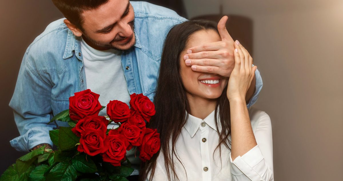 A man giving roses on Valentine's Day